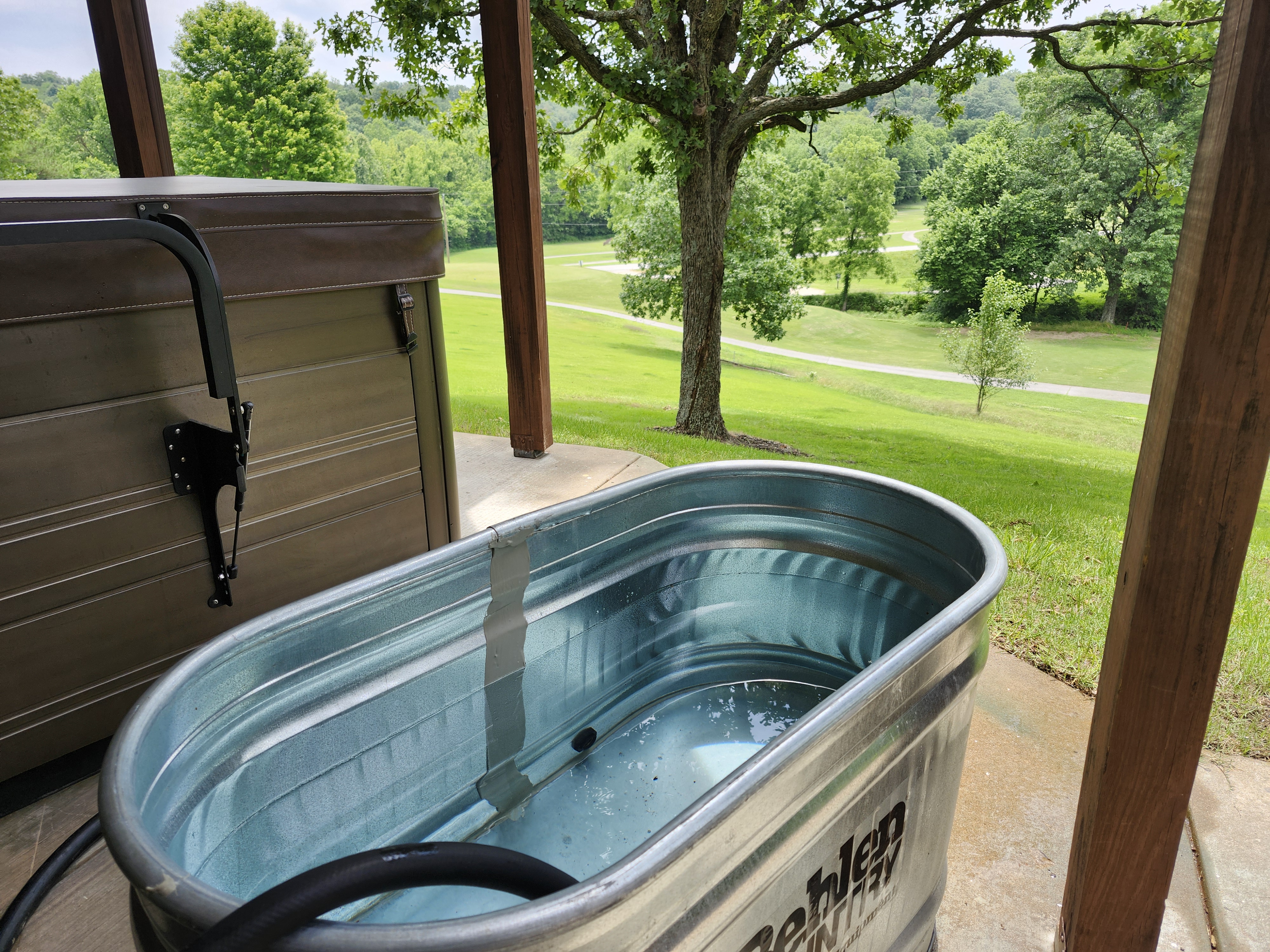 Cold plunge pool with Ozark view